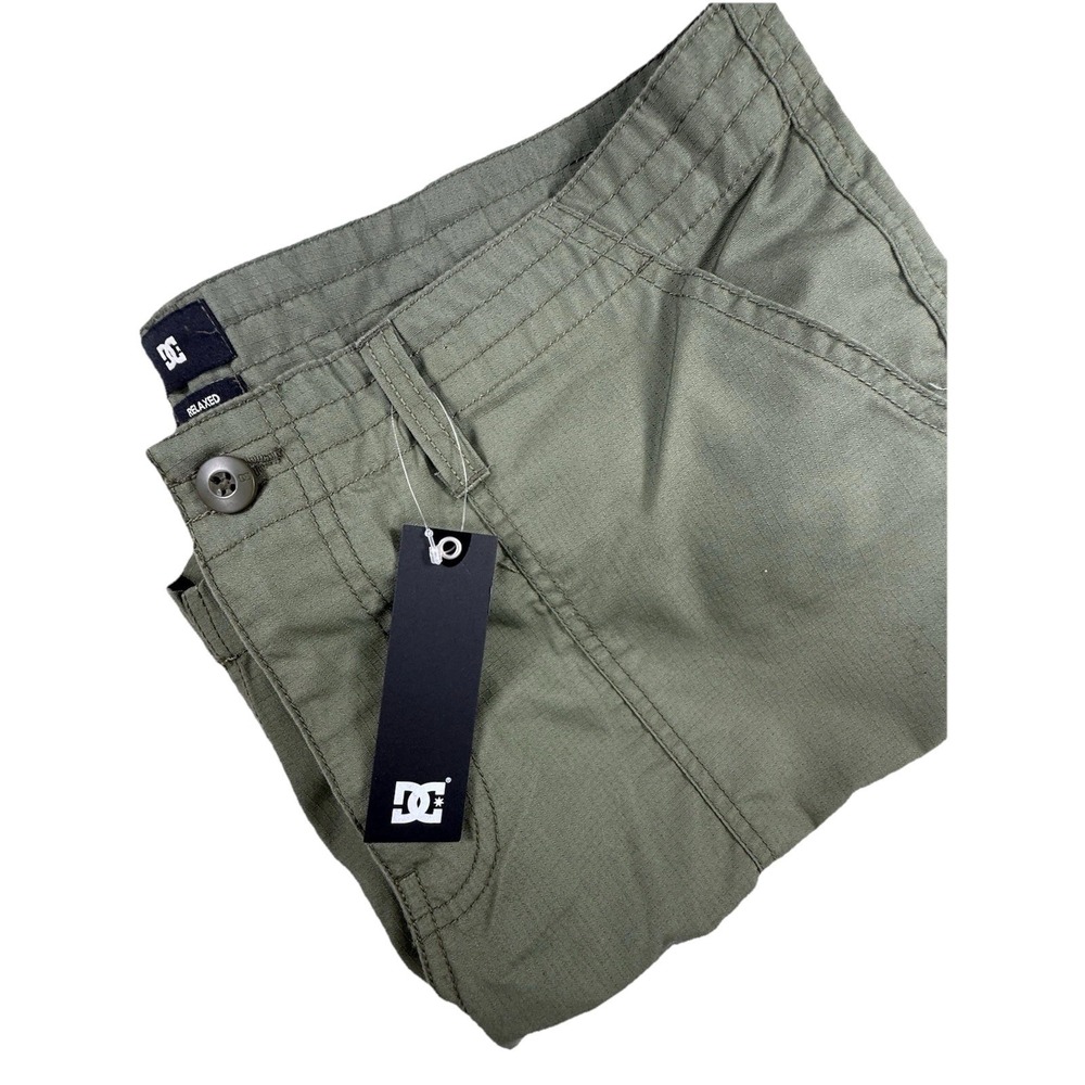 olive green DC relaxed fit cargo shorts in a men's size 34.